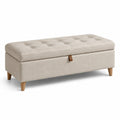 Banc de rangement en tissu polyester beige avec pieds en bois