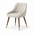 Chaise en tissu beige avec pieds en bois et métal