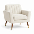 Fauteuil en tissu polyester beige avec pieds en bois et embouts en acier